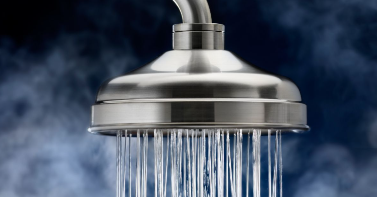 Hot water flowing from showerhead - water heater guide